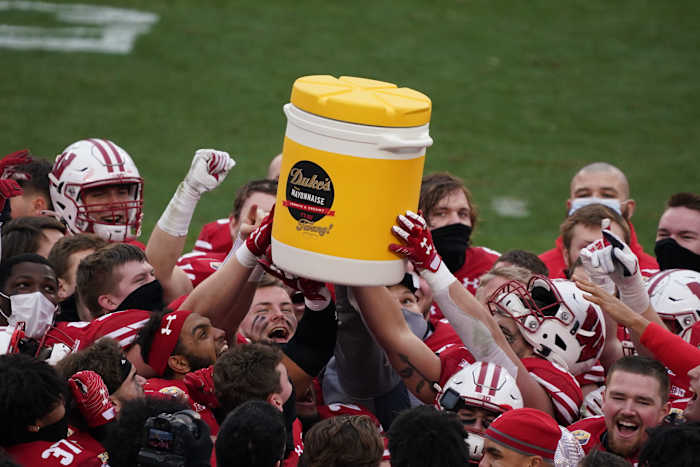 The Wisconsin Badgers celebrate a Duke's Mayo Bowl win.